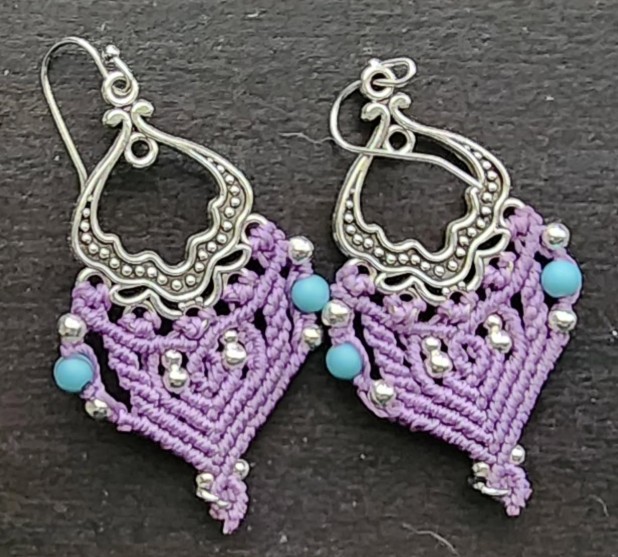 Macrame earrings on ear